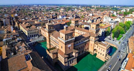 Ferrara - beautiful medieval town in Emilia Romagna Italy. aerial drone view of castle Estense in...