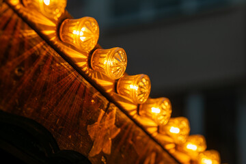 festive lighting on a wooden ceiling