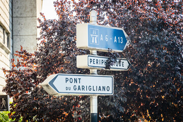 A6, A13, Pont du Garigliano and Peripherique road signs outside the city of Paris, France