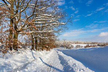 Road in the countryside after heavy snowfall in central Europe