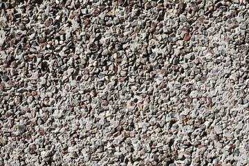 Gravel texture. Small rocks grain pattern for graphic design. Little stones background. Gray noise backdrop. Stone facade texture.
