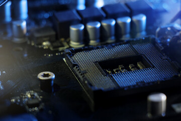 closeup of computer mainboard, electronic circuit board, processor board in computer. hardware and...