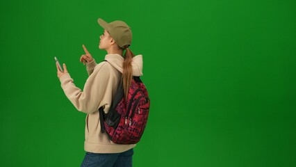 Portrait of person tourist isolated on chroma key green screen background. Close up shot young...