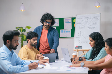 group or Team of co-workers busy working at office during discussion or business planning - concept of communication, startup coordination and leadership.