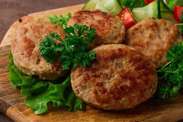 Fried cutlets, turkey, with vegetable salad, top view, no people,