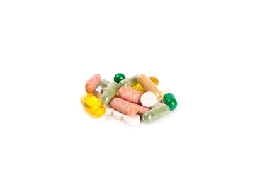 Vitamins and supplements. Variety of vitamin tablets isolated on a white background. Multivitamin complex for every day. Nutritional supplements. Time to drink pills.