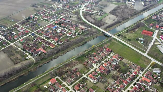 Beautiful reflection on water surface in canal in small town Bac, Serbia