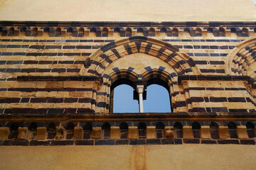 View on a detail of a palace in CefalÃ¹, Sicily, Italy