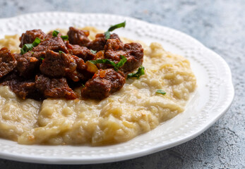 Turkish Food Hunkar Begendi made with Eggplant and Meat.