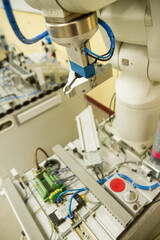 Close-up of a robotic arm for automation. Concept of Industry and electrical automatism.