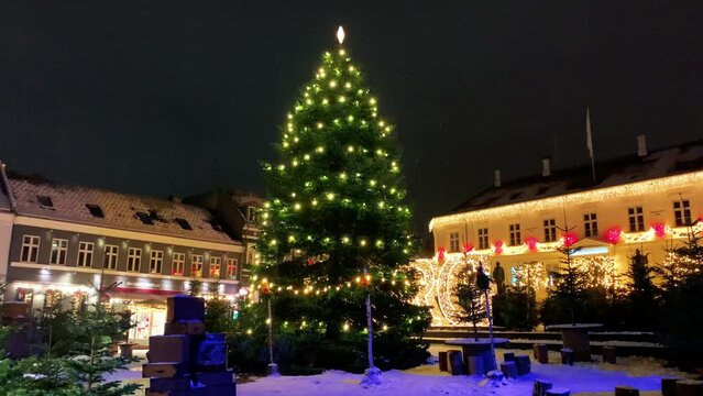 Copenhagen decorated for Christmas holidays, Denmark, Viborg, Shopping street in historical center of Aarhus decorated for New Year holidays, Pedestrians Christmas shopping on Stroget at night.