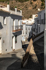 Fototapeta na wymiar Andalusian white village, pedestrian streets, historical charm, Mediterranean serenity. Frigiliana, Spain