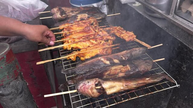 catfish and chicken on the grill