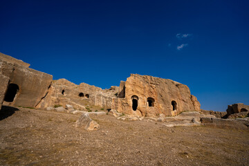 Ruins of rock cut building in Dara ancient city. Mardin, Turkey.