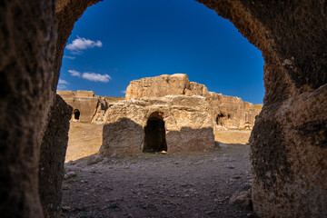 Ruins of rock cut building in Dara ancient city. Mardin, Turkey.
