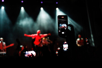 Crowd Cheering and Dancing at a Live Music Concert