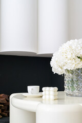 Close up of home decoration of Minimalist home office space with a clean design, white furniture, and artistic decor for trendy and comfortable workspace. real photo.