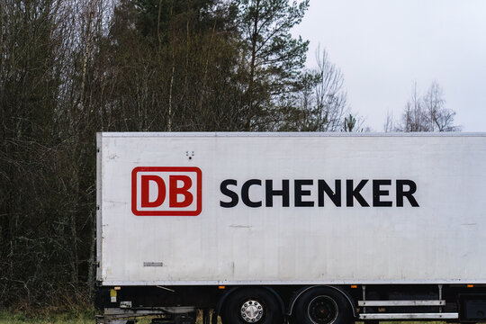 DB Schenker logo on a parked trailer in M&auml;nts&auml;l&auml;, Finland.
