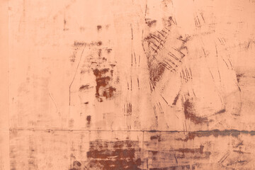 Obraz premium Empty grunge metallic texture with rusty stains in trendy color 2024 year Peach Fuzz