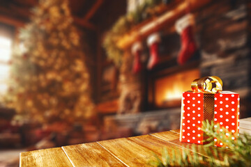 Fototapeta na wymiar Wooden desk of free space for your decoration and christmas gift. Home interior with fireplace and warm natural light. Mockup backdrop and cold december time. 
