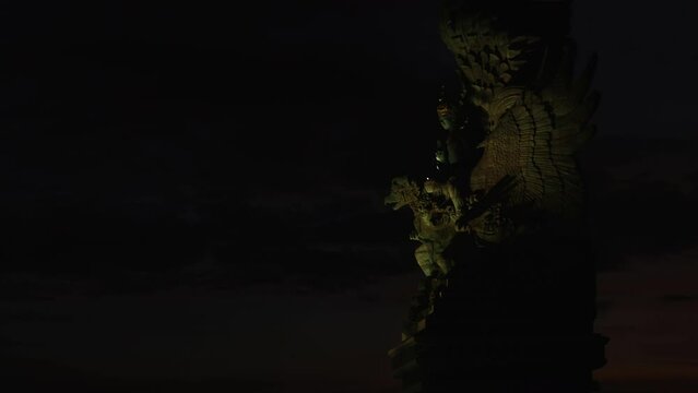Timelaps of Statue of Garuda Wisnu Kencana on sunset, Bali, Indonesia