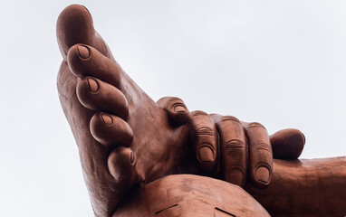 hindu god lord shiva foot isolated statue with bright background at morning from unique perspective