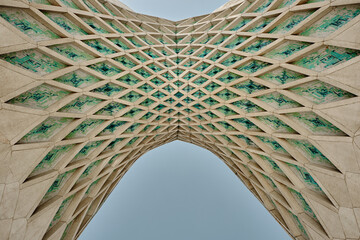Tehran, Azadi Tower in Iran, tower of freedom or liberty low angle view.