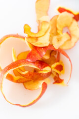 Peeling red apples