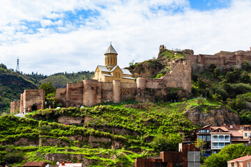 travel to Georgia - view of ancient Narikala fortress from Metekhi viewpoint in Tbilisi city on...