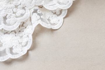 Beautiful laces on paper background. Wedding and romance theme.