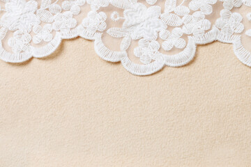 Beautiful laces on paper background. Wedding and romance theme.