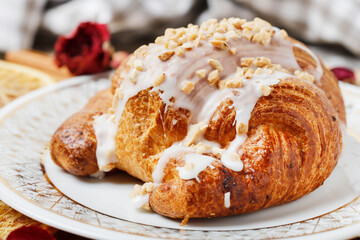 Saint Martin's croissant. Traditional polish cake with poppy seed filling decorated with icing and...
