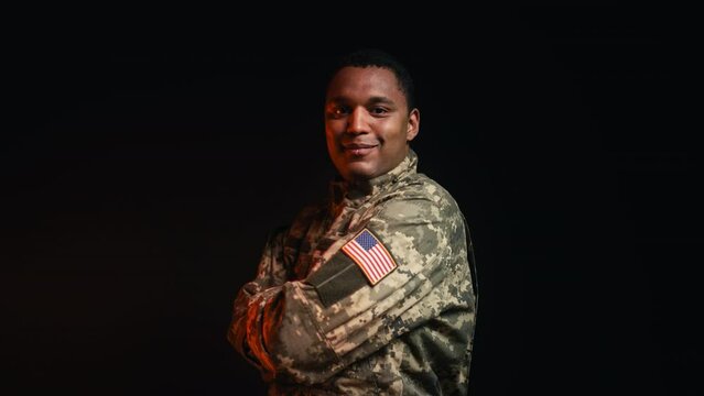 Portrait of professional U.S. army military man in uniform on black background