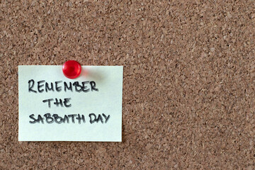 Remember the Sabbath Day, handwritten quote on cork pin board. Copy space. Christian holy time,...