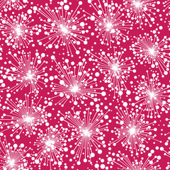 Seamless geometric pattern with sparkling white fireworks on a red background. Explosion of small dots. Dotty texture. Vector illustration