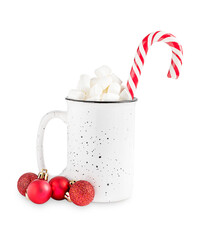 Sweet homemade festive cocoa drink or hot chocolate with marshmallow topping decorated with traditional candy cane served in ceramic mug or cup with red christmas baubles isolated on white background 