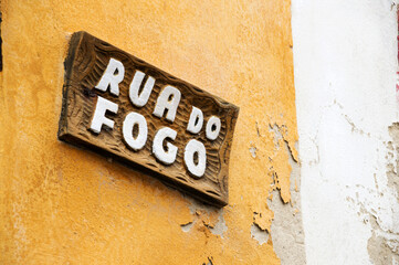 Wooden sign saying Rua do Fogo