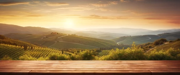 Fotobehang empty wooden table with a view of the early morning sun over a tuscan vineyard © id512