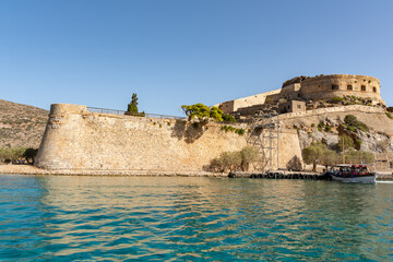 Fototapeta premium Crossing Elounda bay looking towards the historic island of Spinalonga. Crete, Greece.
