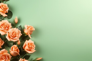 Forest Green Roses Flower Border Over a Peach Background With Copy Space. Copy space.