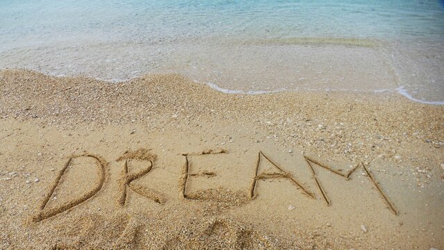 Dream - letters on the beach by the sea