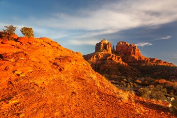 Sunlight Reflected of Sandstone Butte Cliffs.  Scenic Cathedral Red Rock State Park, Sedona Arizona USA Desert Autumn Landscape, Blue Skyline