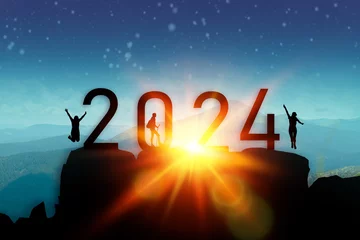 Tuinposter Loading year 2024. Successful lucky man to the top of the mountain from 2024 year number. Business start up or goal to success © Shi 
