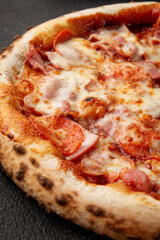 Pizza with bell peppers, onions, cheese and sauce