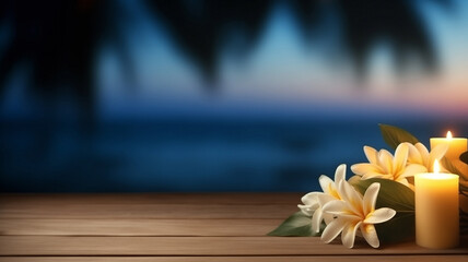Wooden tabletop for product display with night tropical white flowers and burning candles. Sea and...
