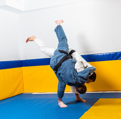 Brazilian jiu-jitsu and grappling training for men in a self-defense gym