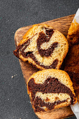 sweet biscuit roll brioche cake chocolate dessert cooking appetizer meal food snack on the table copy space food background rustic top view