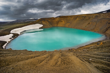 Krafla is a volcanic caldera of about 10 km in diameter with a 90 km long fissure zone, in the...