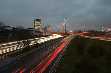 Fototapeta na wymiar Long exposure shot of the light trails on B7 and A52 freeway near Meerbusch