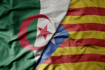 big waving national colorful flag of catalonia and national flag of algeria .